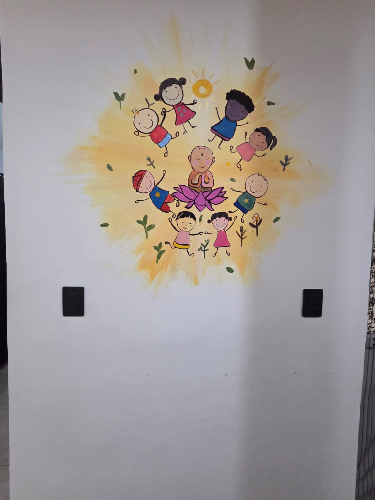 Mural infantil de bienvenida en Nenelandia